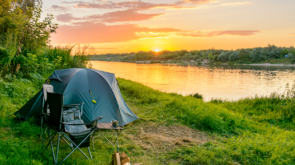 Camping tent in a camping in a forest by the Oka river. Russia